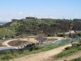 The Baldwin Hills Scenic Overlook is directly across La Cienega Boulevard from the Kenneth Hahn State Recreation Area, which features hilly paths and ponds.